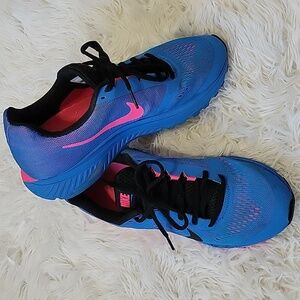 Nike Women's Blue Running Shoes with Pink Swoosh